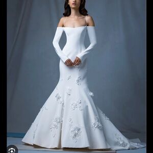 Elegant White Wedding Gown with Floral Embroidery